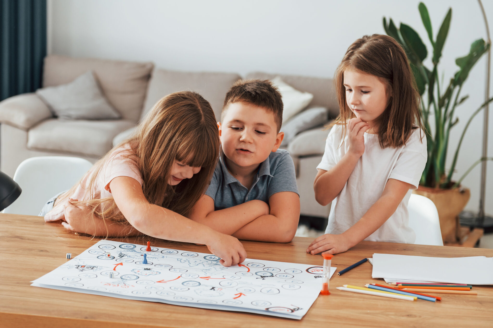 Step by step game. Kids having fun in the domestic room at daytime together